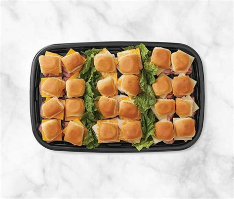 Signature Select Croissant Sandwich w/ Chicken Apple Sausage, Egg & White American Cheese. . Walmart deli party trays